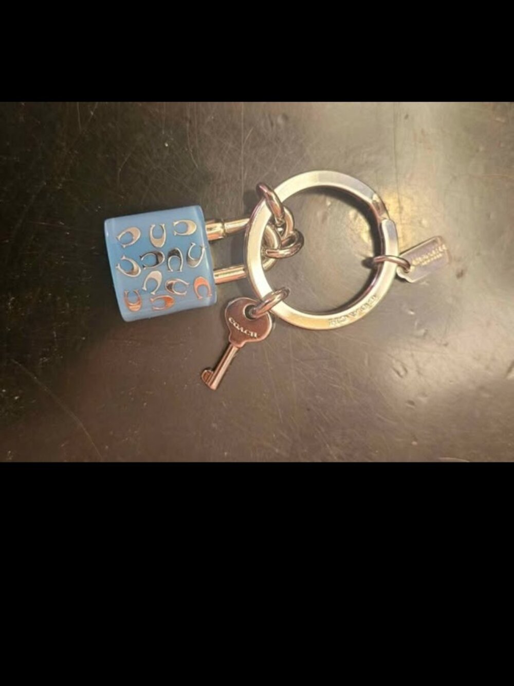 Coach lock and key charm